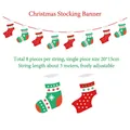 Christmas stocking banner with 8 red and green patterned pieces on 3m adjustable rope - Christmas Stocking Banner