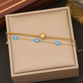 Goldene zweilagige Evil Eye Halskette auf beiger Schmuckbox mit Naturlicht - 2# Mehrlagiges Böser Blick Armband (N1197)