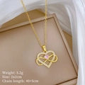 Detailansicht der goldenen Herzkette mit rosa Stein und funkelnden Kristallen - Gold Herz Unendlichkeit (G251)
