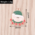 Christmas elf enamel pendant accessory in green and red with 21mm by 18mm dimensions - Christmas Elf (YD1319)