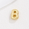 Close-up of golden letter B charm with smooth metallic finish for DIY bracelets - Letter B / Gold