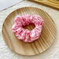 Pink and white checkered scrunchie on a wooden tray with a soft fabric texture - Dark Pink Plaid