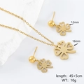 Detailansicht des goldenen Kleeblatt-Schmucksets mit Maßen und Gewichtsinformationen - Vierblättrige Blume