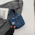 Dunkelblaue Denim-Eimertasche mit Fransen-Details und dekorativen Kordelzügen am Beutel - Dunkelblau