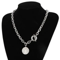 Silver chain necklace with Saint Benedict medal pendant on a professional black mannequin - Steel Color Necklace (KN202635-Z)