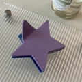 Detail shot of a star-shaped hair claw clip in purple and blue bicolor plastic design - Purple Blue Mix