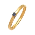 Detail of a golden elastic bracelet featuring a heart-shaped deep blue sapphire stone - Bracelet-Dark Blue