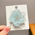 Light blue matte flower hair clip with center beads and golden stamens on card - 6# Blue Camellia Single