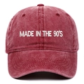 Detail of white 3D embroidery Made in the 90's on washed red vintage baseball cap - Burgundy