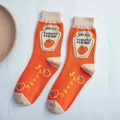 Orange cotton crew socks with tomato ketchup pattern and beige heel and toe accents - One Size / Khaki Sock Cuff