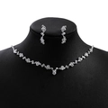 Sparkling zircon flower bridal necklace and teardrop earrings set on a black bust display - E4862-3 Silver Y-Shape Flower Cluster Set