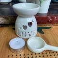 White ceramic oil burner with LOVE engraving, heart cutouts, and a small candle spoon - LOVE / Aromatherapy Burner + Candle Tray + Tealight