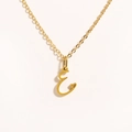 Detailed close-up of gold stainless steel necklace with capital letter E and heart cutout - Gold - Letter E