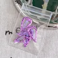 Sweet purple sequin waterdrop hair clips set in transparent packaging on fabric background - Purple Heart