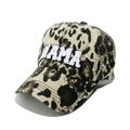 Detail of white MAMA towel embroidery on a leopard print washed baseball cap - Leopard Print
