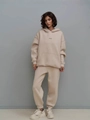 Women's two-piece knitted tracksuit with drawstring hoodie and high-waist joggers in beige - Apricot
