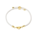 Detailed view of white braided bracelet featuring a gold star charm and adjustable slide - White (Star)