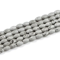 Gedetailleerd zicht op 8x12mm ovale grijze druzy agaat kralen voor handgemaakte sieraden - Trommelkraal 8*12mm (16 Kralen Lengte 200mm) / Verguld Wit K