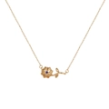 Golden flower pendant necklace with a central blue rhinestone on a fine chain link - September