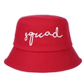 Detailed close-up of white squad embroidery on a red cotton twill bucket hat - Rose Red Squad
