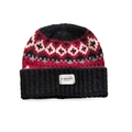 Detalle del patrón de punto Fair Isle y etiqueta tejida en un gorro de punto de invierno - Gorro de lana / Negro