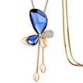 Rose gold butterfly pendant necklace featuring dark blue crystals and diamonds - Gold + Royal Blue