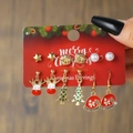 6 pairs of Christmas earrings set with reindeer, tree, and hat charms on festive card - E1183-1 (6 Pairs Christmas Set)