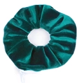 Green velvet scrunchie hair tie with side zipper pocket and white fabric label detail - Green