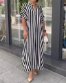 Detail of V-neck opening and vertical striped pattern on a loose casual maxi dress - S / Bottoms / Black