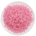 Pink translucent acrylic beads in a white bowl for DIY jewelry and phone chain making - Frosted Rose Red Round Beads