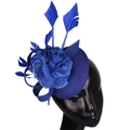 Elegant navy blue fascinator hat with flower and feathers on a mannequin head - Sapphire Blue