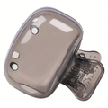 Close-up of a translucent taupe plastic hair claw clip with round cutouts and smooth finish - Gray