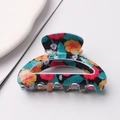 Black semi-round hair claw clip with colorful floral pattern for women's hairstyling - Black Tropical Floral