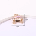 Golden carriage charm with pink enamel detail for DIY jewelry, 1.5cm by 1.5cm size - Pumpkin Carriage