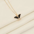 Goldene Schmetterlingskette mit schwarzen Schmucksteinen und funkelnden Zirkonia - 4# Schwarz
