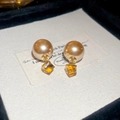 Detailed macro view of vintage flower pearl earrings with amber crystal in luxury gift box - Brown Amber Cubic Pearl Style (60#)