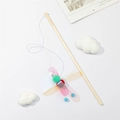 Interactive cat wand toy with wooden stick and colorful dragonfly tassel on white surface - Sequin Insect Style (C)