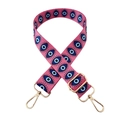 Detail of adjustable polyester bag strap with pink evil eye patterns and gold hardware - Blue Evil Eye