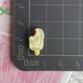 Luminous glitter popsicle resin charm in pale yellow with ruler for size measurement - Luminous Chocolate Yellow Popsicle