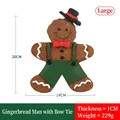 Gingerbread man decor with green suspenders and top hat, size 20cm by 14cm - Large Gingerbread Man with Bowtie