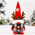 Detailaufnahme einer Weihnachtswichtel-Puppe mit Rentiergeweih und festlichen Schneeflocken - Rentier-Gnom-Dekoration Weiblich (Zopf-Stil)