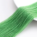 Macro shot of 32-facet green crystal glass beads for DIY jewelry making and curtains - 1MM String Approx 190pcs (Actual Size 2MM) / Grass Green
