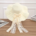 Beige woven straw sun hat with elegant lace trim and a large bow with long ribbons - Lace Bow Style - Creamy White