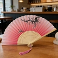 Pink gradient bamboo folding fan with ink plum blossom pattern and pink tassel - Pink Plum Bird