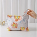 Cream cosmetic bag featuring orange poppy floral patterns and 3D tassel details - 26x18cm / Yellow Flower Large