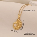 Gold stainless steel shell pendant necklace with white oval gemstone on textured background - Conch