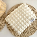 Portable cream-colored bubble texture cosmetic bag with Have a Nice Day woven label - Bubble Storage Bag - Rice White