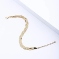 Detailed shot of golden triple-braid snake chain bracelet with lobster clasp and extender - Gold