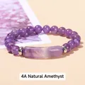 Minimalist 4A natural amethyst bracelet featuring purple round beads and a silver metal spacer - 4A Natural Amethyst