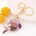 Close-up of golden koi fish keychain with purple rhinestones and enamel detailing - Goldfish 5 (Purple)